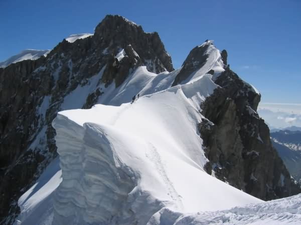 Alpinisme avec Pierre Pisano Guide de haute montagne Alta-Via à Saint-Gervais Mont Blanc