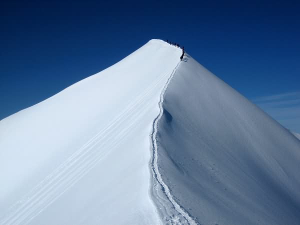 Alpinisme avec Pierre Pisano Guide de haute montagne Alta-Via à Saint-Gervais Mont Blanc