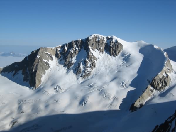 Alpinisme avec Pierre Pisano Guide de haute montagne Alta-Via à Saint-Gervais Mont Blanc