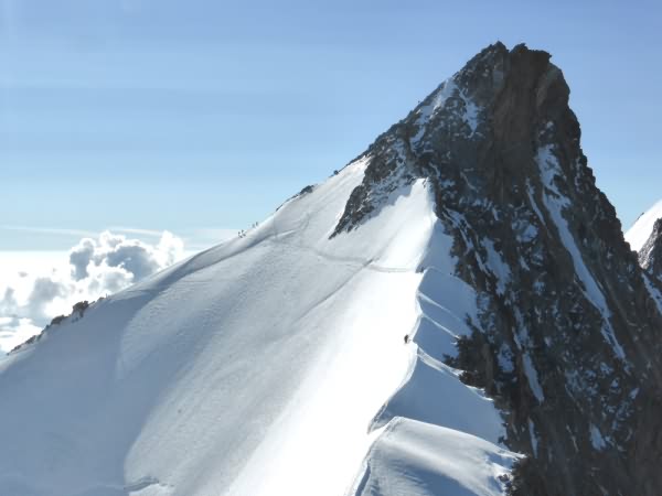 Alpinisme avec Pierre Pisano Guide de haute montagne Alta-Via à Saint-Gervais Mont Blanc